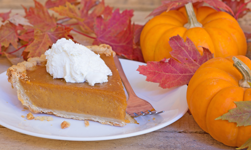 Pumpkin pie with whipped cream on top