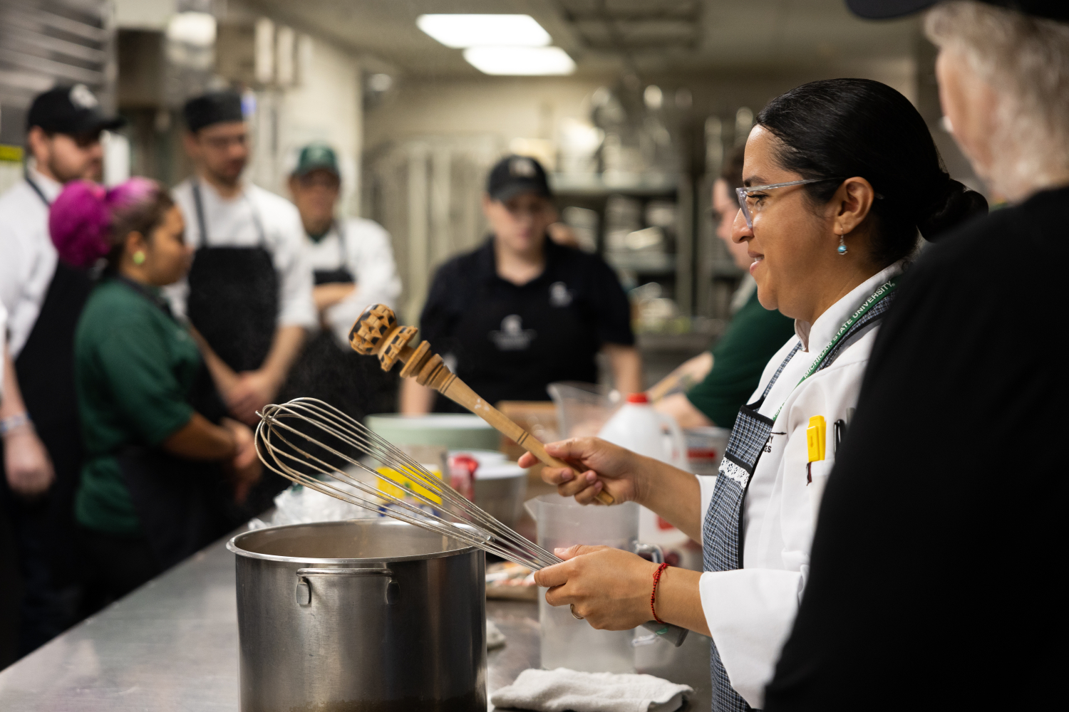 Kitchen utensil demonstration during Mexican cuisine cooking class