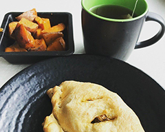 Vegetable calzone with a side of roasted sweet potatoes